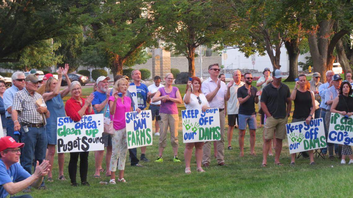 More than 100 people rallied Monday night at Howard Amon Park in Richland in opposition to breaching the four lower Snake River dams in Eastern Washington.