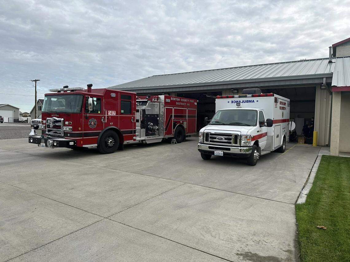 A fire truck and ambulance outside of the Benton County Fire District 4 station.