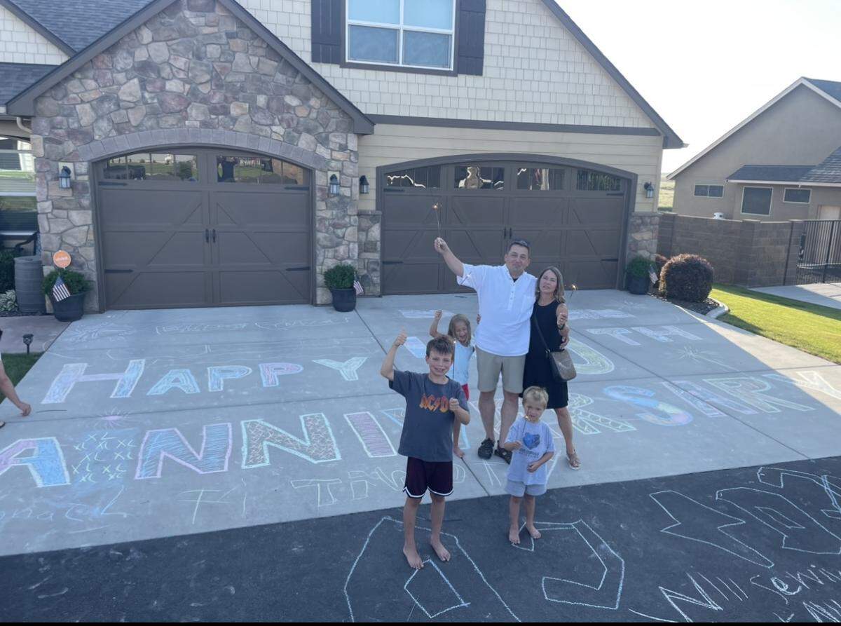 Ken and Melanie Primus, both 60, of Richland, celebrated their 40th wedding anniversary on Saturday with family. Twenty-five years ago, their children wrote out a celebratory message in chalk to celebrate the couple’s 15th anniversary. Their grandchildren chose to recreate that message over the weekend.