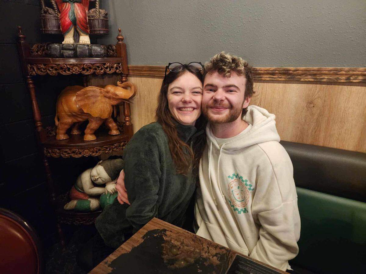 Aaron and Taylor Thompson are all smiles for the camera on their wedding day at The Emerald of Siam, Feb. 1.