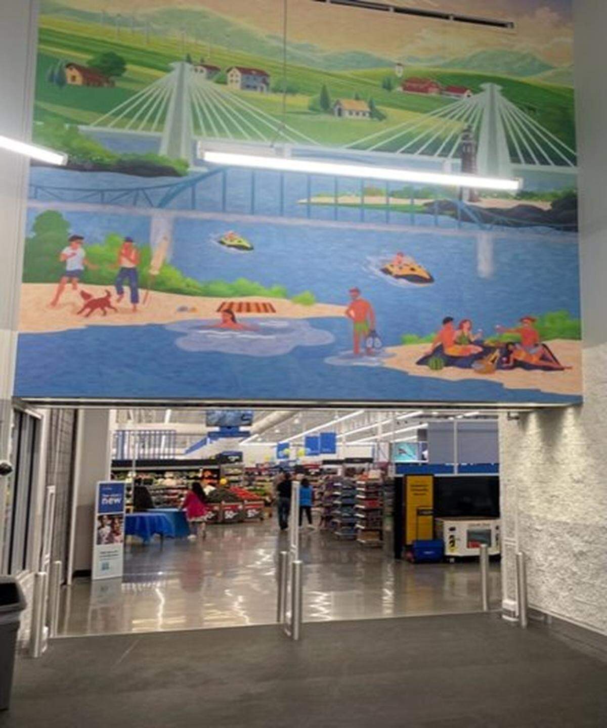 Walmart unveiled a Kennewick-themed mural over an entrance to its its updated store at 2720 S. Quillan St. on Aug. 4 following a storewide facelift. The mural program is installing local art at stores across America.