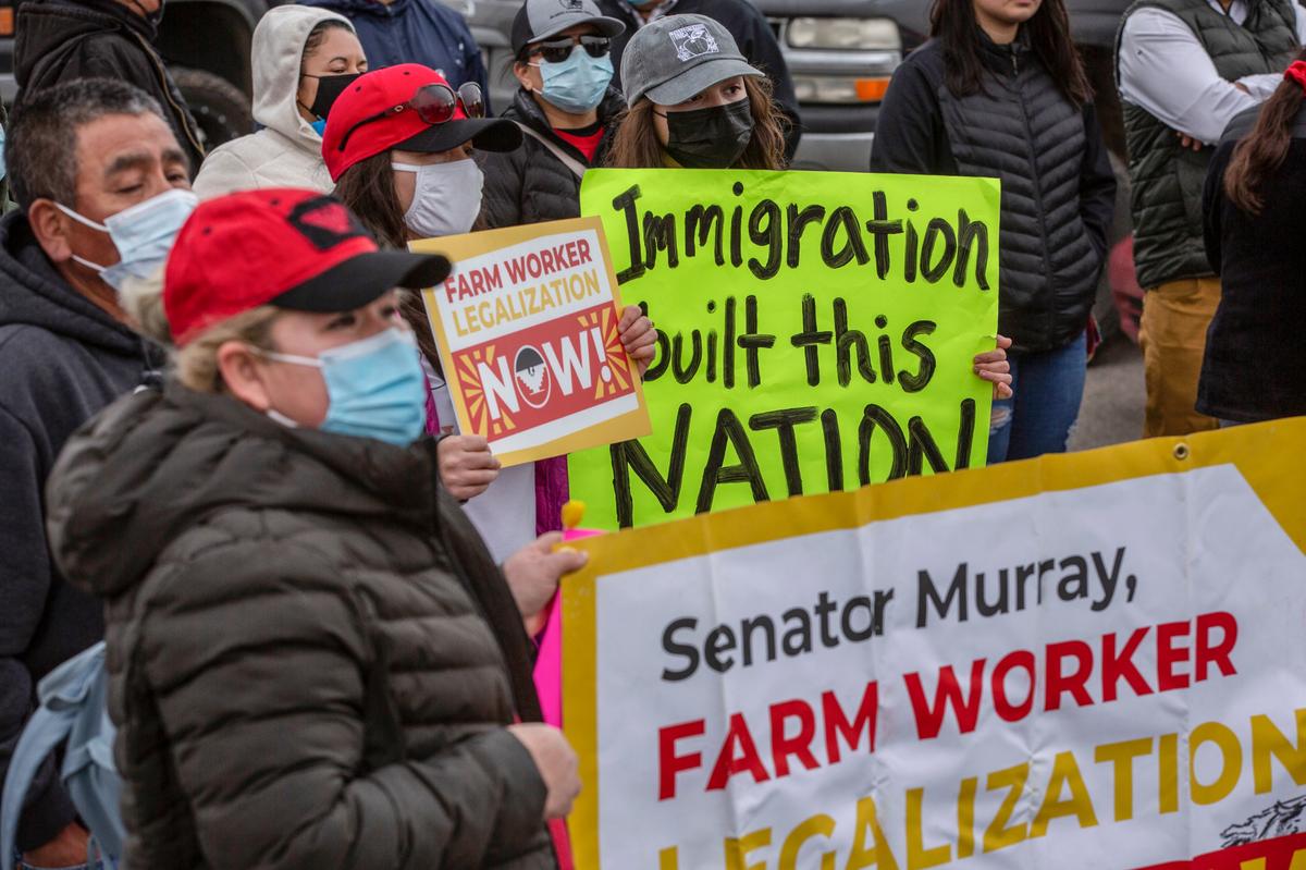 About 50 United Farm Workers members marched in Pasco, joining a nationwide call for immigration reform through a “Day Without Immigrants” rally.