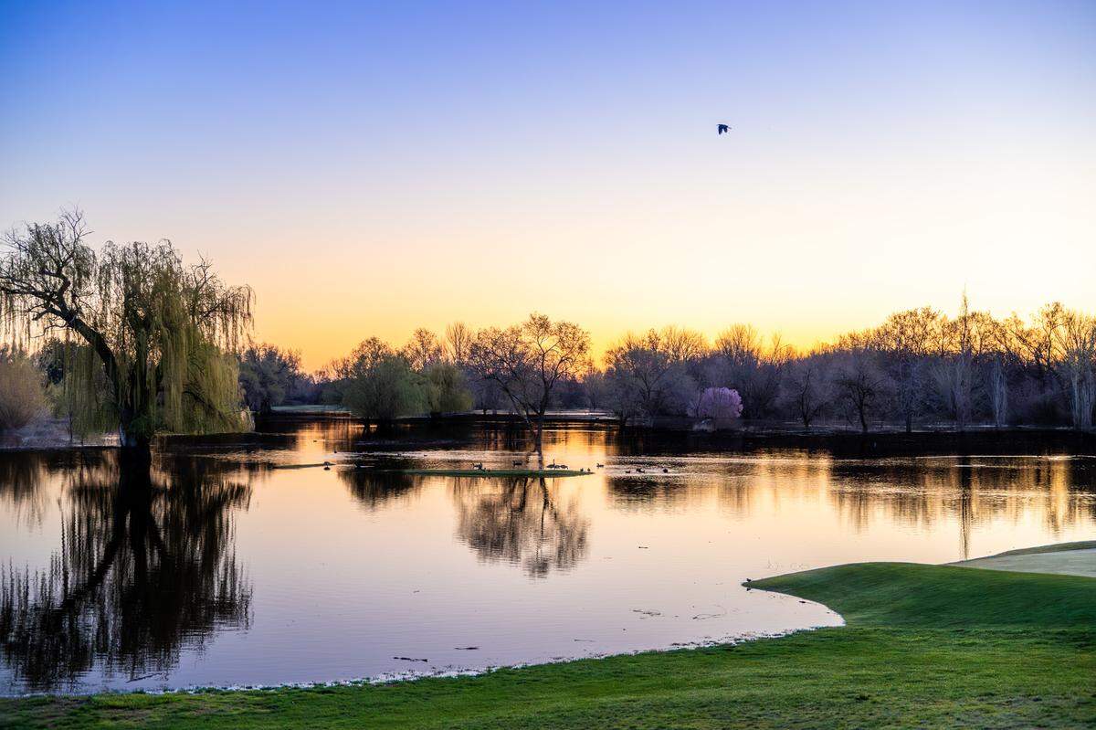 Floodwater from the Yakima River covers the south side of West Richland Golf Course below the clubhouse on Sunday, March 22, 2026, as the river rises toward minor flood stage.