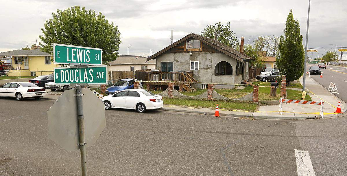 Crime scene tape and traffic barricades encircle the house at 1901 E. Lewis St. in Pasco where one person was fatally shot and two others wounded. Police are still investigating the Wednesday night incident occurred in the back yard of the home. Watch a video at: tricityherald.com/videos