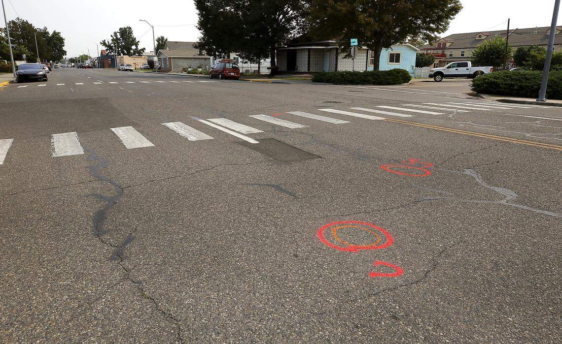 Investigative paint marks the roadway where Lorenzo Ayohua Ramos was fatally struck on West Clark Street in August 2025.