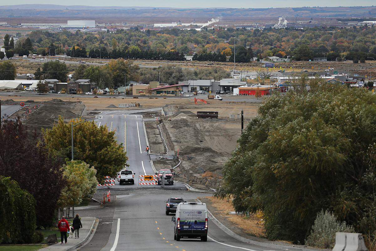 Traffic barricades the new southern extension of Queensgate Drive at Shockley Road in south Richland. The newly paved section starts at Keene Road leads to a new construction development.
