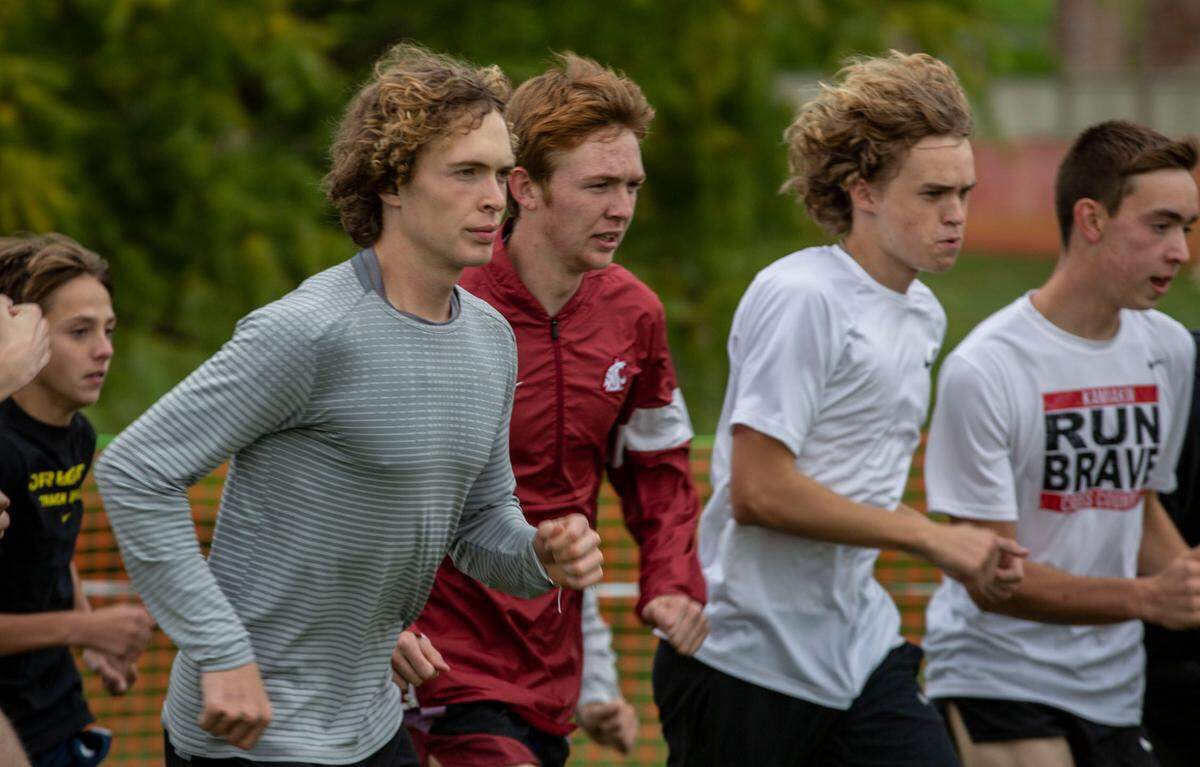 Kamiakin senior Isaac Teeples and the Boys Cross Country team in 2021.