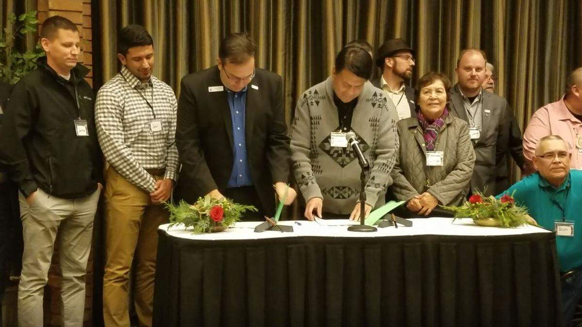 Pasco Mayor Matt Watkins and Colville Confederated Tribes Chairman Rodney Cawston agreed to work together on education and tourism efforts associated with the purchase of near 200 acres of land by the tribe.