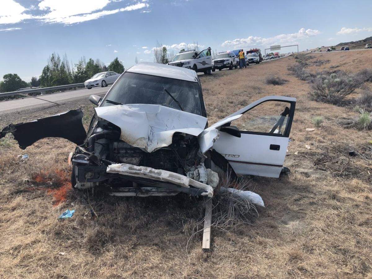 State troopers respond Thursday to a car crash along Interstate 182 in Pasco. The crash came after a head-on around noon that closed the freeway for hours.