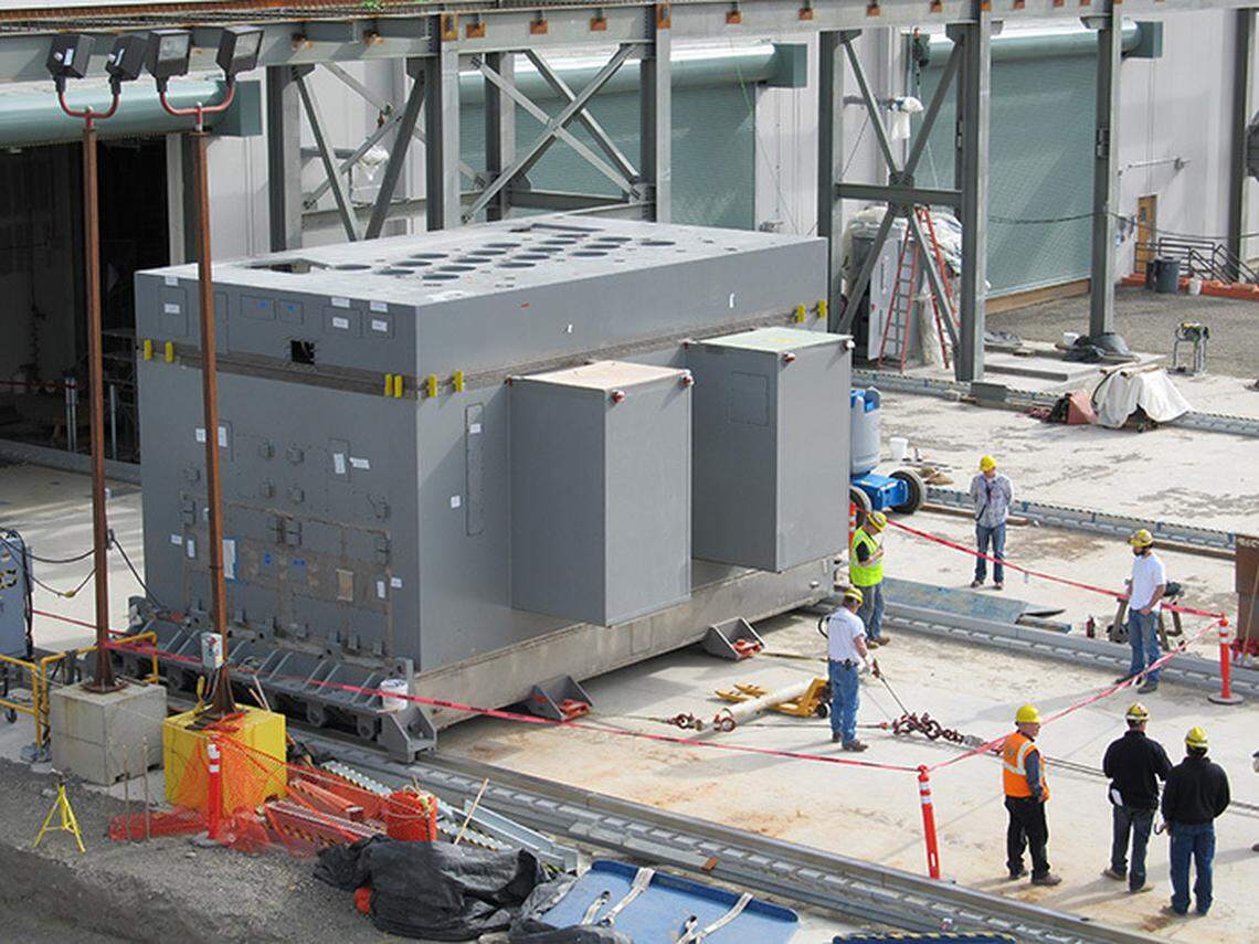 Crews pull a melter from the Hanford nuclear reservation’s vitrification plant for inspection during construction of the plant.