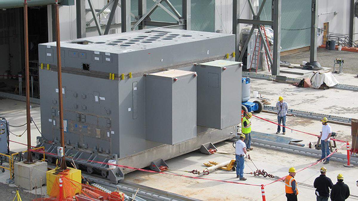 Crews pull a melter from the Hanford nuclear reservation’s vitrification plant for inspection during construction of the plant.