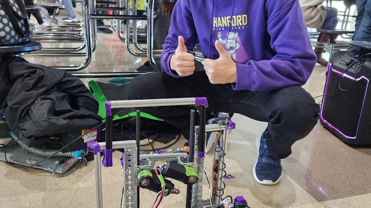 Kevin Nguyen is shown at the FTC robotics competition.
