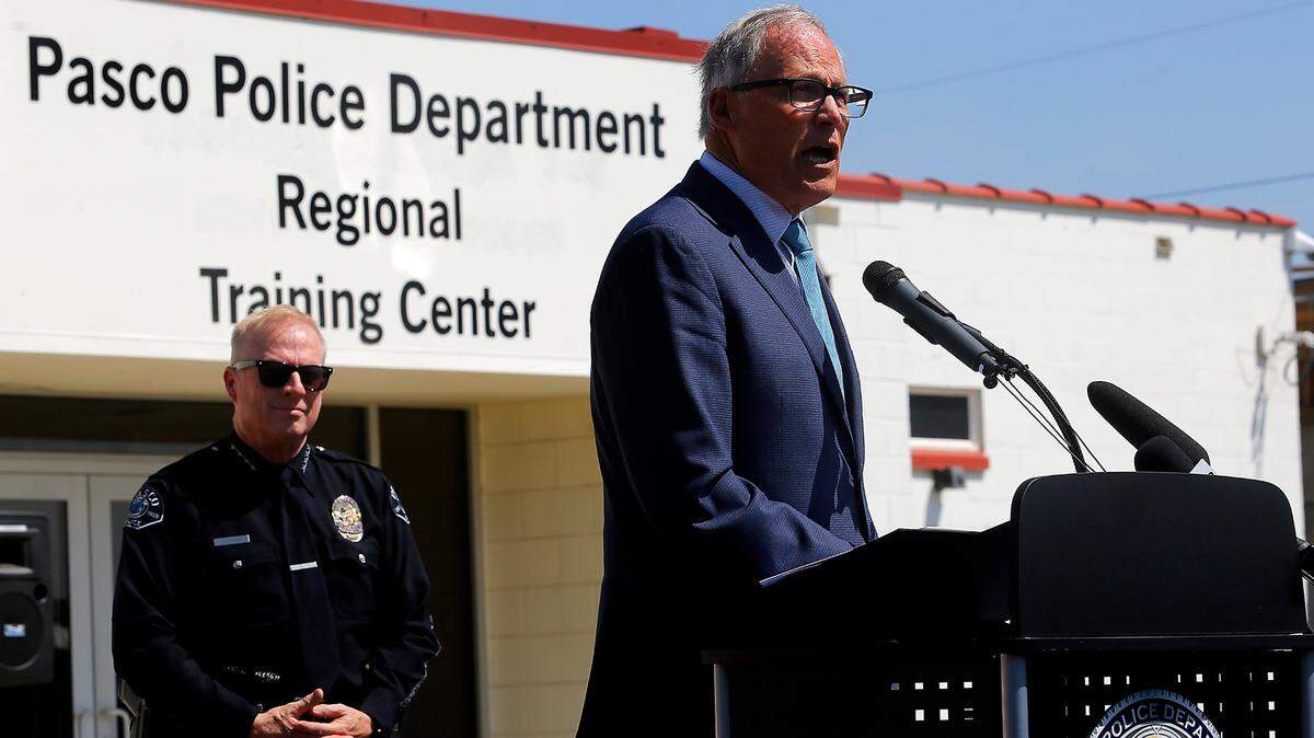 Washington Gov. Jay Inslee addresses community members, law enforcement officials and elected officials at the grand opening ceremony of the Pasco Campus of the Regional Police Department Training Center in the TriCities earlier this year.