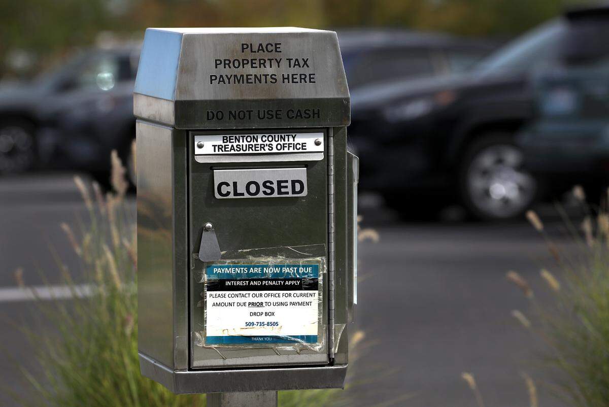 The Benton County Treasurer’s Office maintains a property tax payment drop box, opened during tax collection season, in the parking lot of the new administration building complex in west Kennewick.