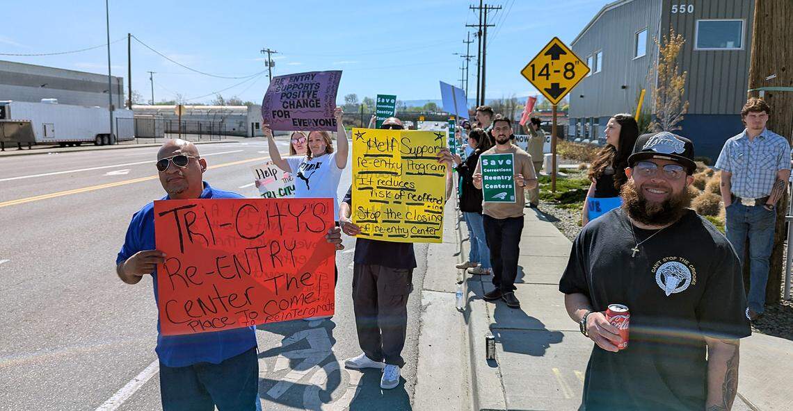 About 50 people rallied April 6 outside the Washington corrections department’s Tri-Cities Reentry Center for prison inmates in downtown Kennewick.