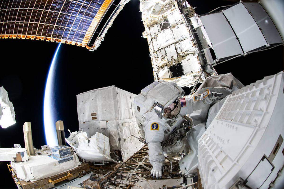 NASA spacewalker Kayla Barron of Richland, Wash. is pictured during a 6 1/2-hour spacewalk on Dec. 2, 2021, to replace a failed antenna system on the International Space Station.