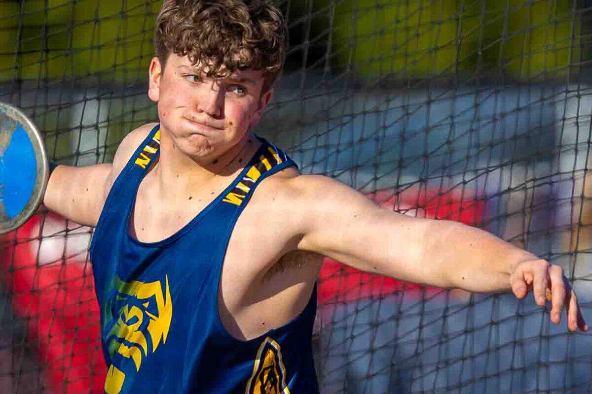 A Southridge student throws a discus at a track and field meet on March 26.