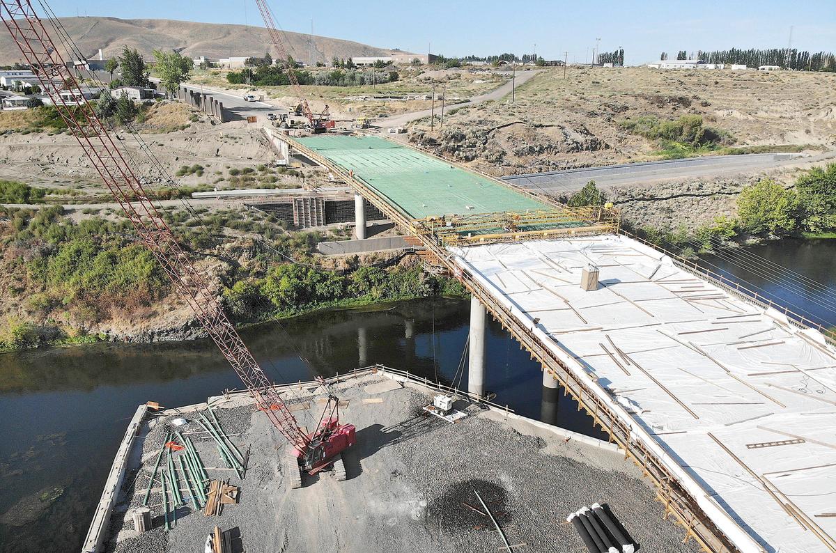Initiative 976 on the November ballot would set car tab fees at $30 and eliminate other transportation districts like the one in Richland that was formed to help pay for the Duportail Bridge project. Watch a video at: tricityherald.com/video