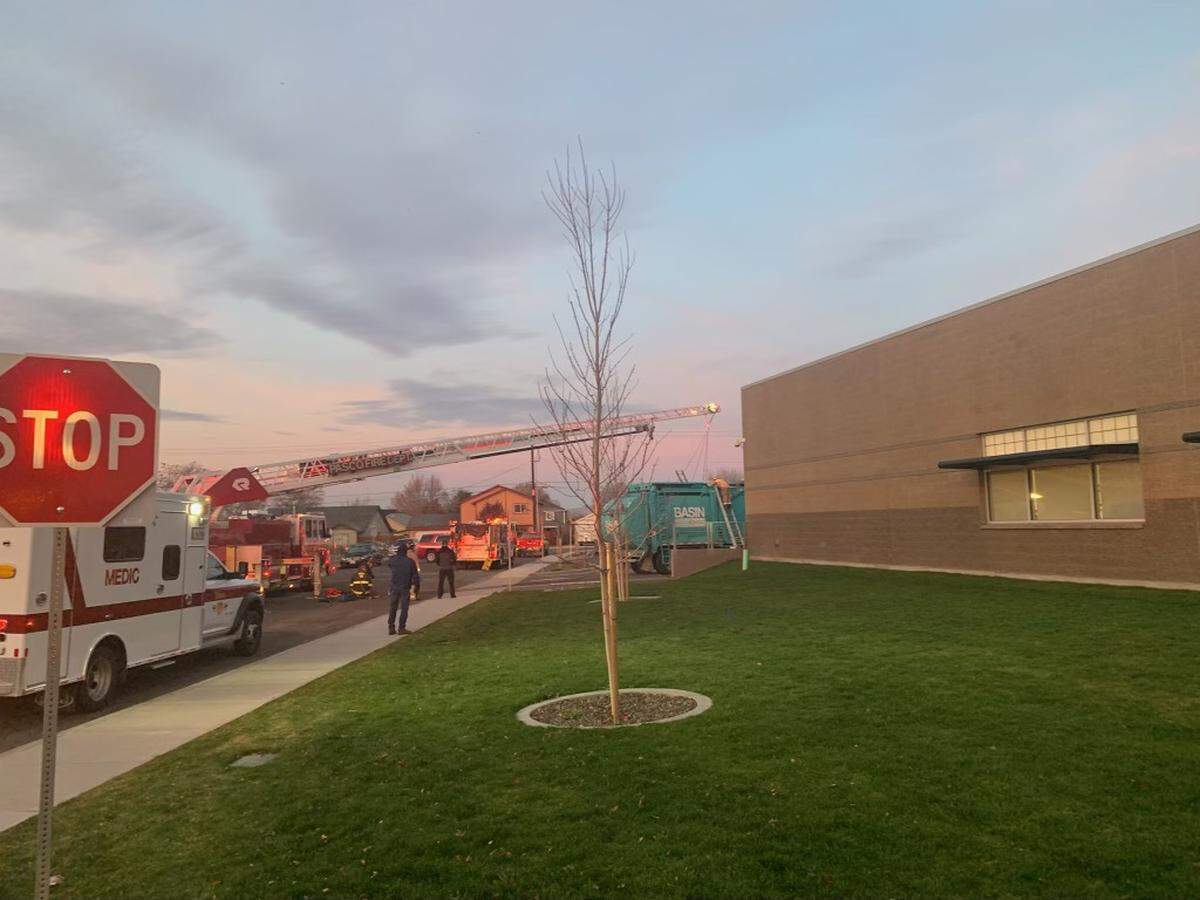 A transient was rescued from a garbage truck outside Stevens Middle School in Pasco on Friday morning.