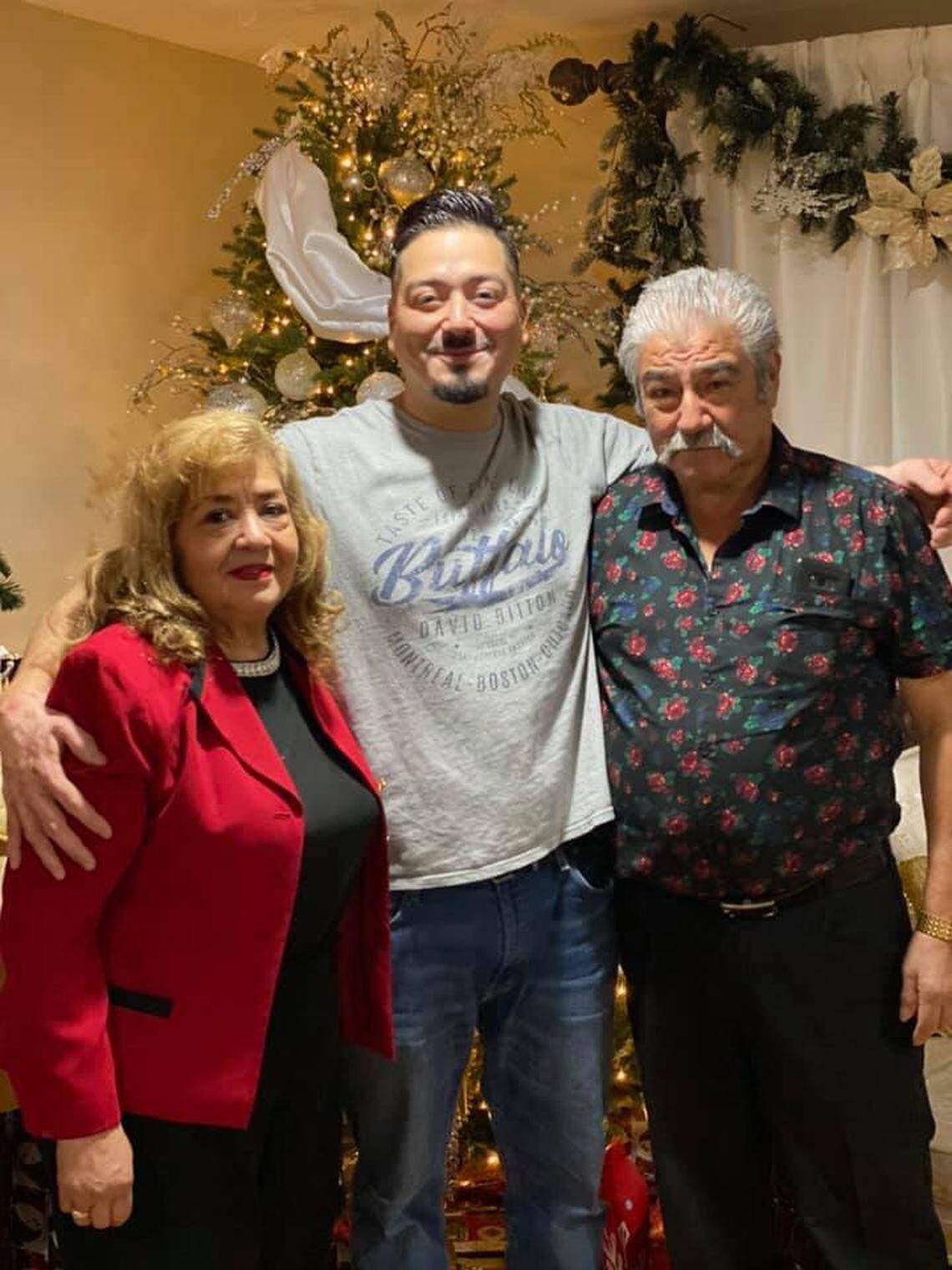 Pasco High grad David Avila died earlier this month from complications of COVID-19. He is shown with his parents, Alfredo and Felipa Avila, longtime Pasco restaurant owners.