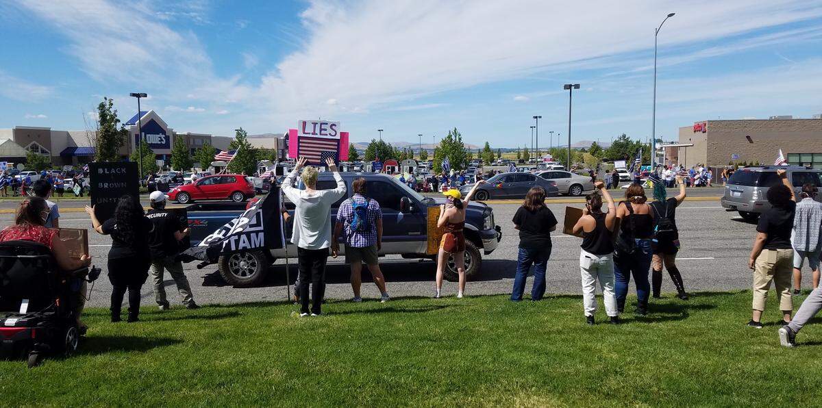 Black Lives Matter supporters rallied against systemic injustice and called for police reforms, while Back the Blue supporters held a rally across the street on Road 68.