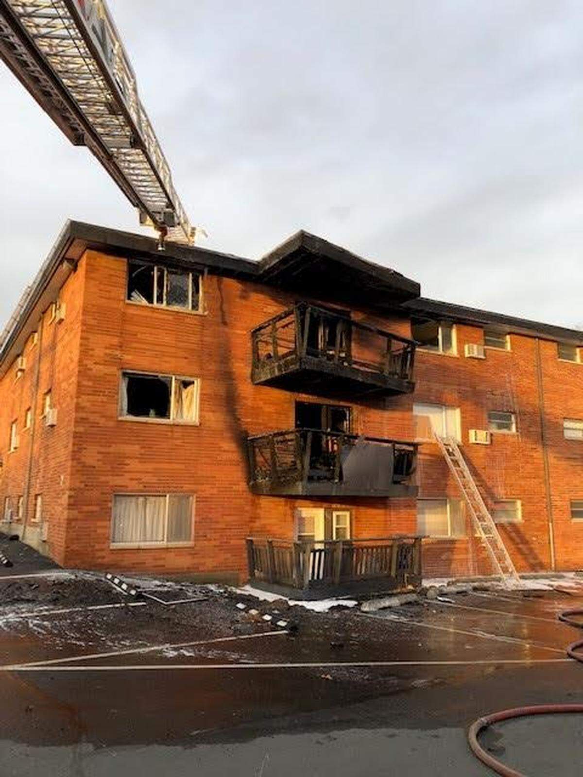 Fire spread in a second and third floor units of the Dolphin Apartment complex in Kennewick Friday afternoon.