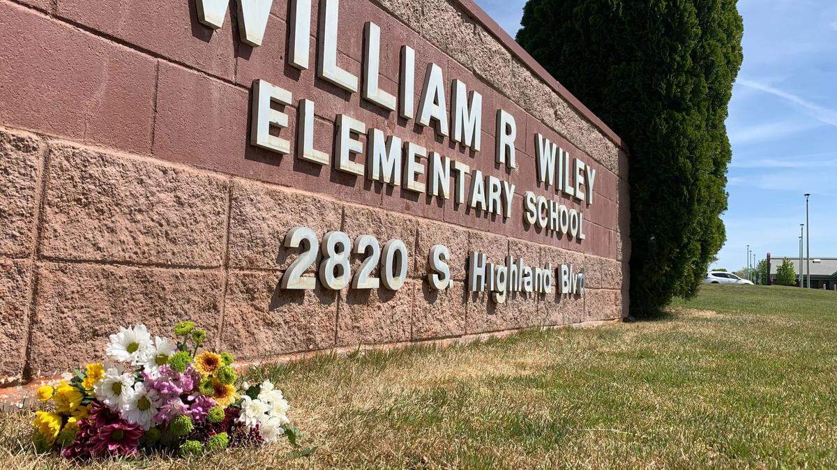 Flowers were placed at William Wiley Elementary School in West Richland, Wash., after paraeducator Amber M. Rodriguez was shot outside the school.