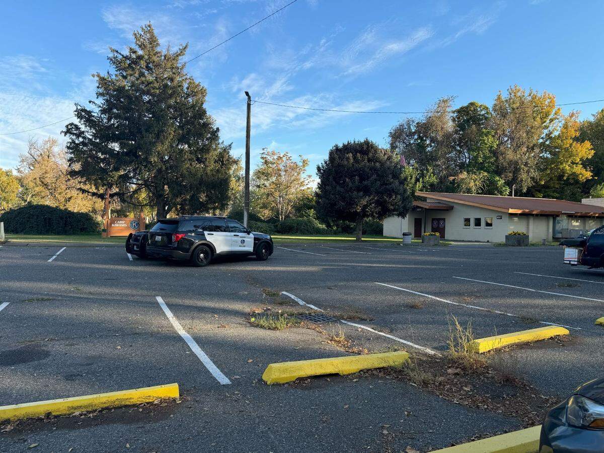 Richland police were parked at the old Kiwanis Campground Friday. The city shut down parts of two parks Friday.