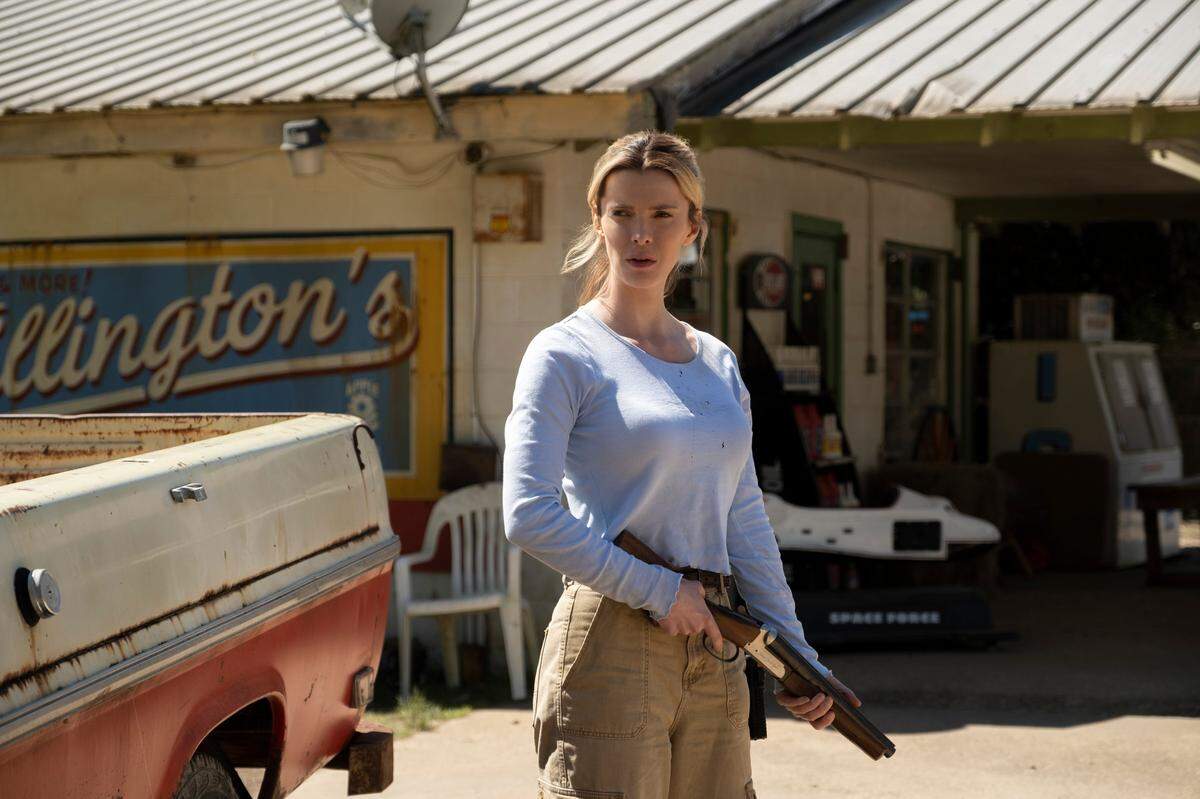 This image released by Universal Pictures shows Betty Gilpin in a scene from “The Hunt.” (Patti Perret/Universal Pictures via AP)