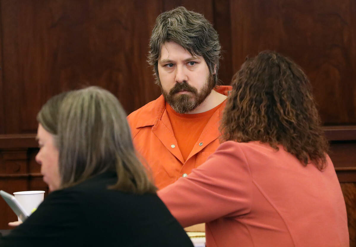Attorney team Shelley Ajax, left, and Sheri Oertel, sit with Joshua D. Davis during Friday's sentencing hearing in Franklin County Superior Court in Pasco.