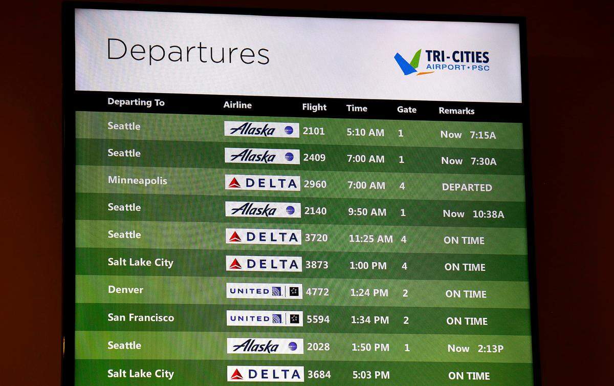 Tri-Cities Airport departure display board in the early morning hours of January 11, 2023 following a nationwide grounding of air travel because of an FAA computer glitch.