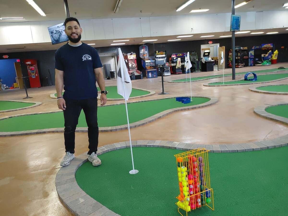 Reyes Gonzales poses at Tee Time, the Tri-Cities newest indoor mini golf facility. The 18-hole course is an all-ages destination and celebrates its grand opening with food trucks, face painting and more on Friday, May 3.