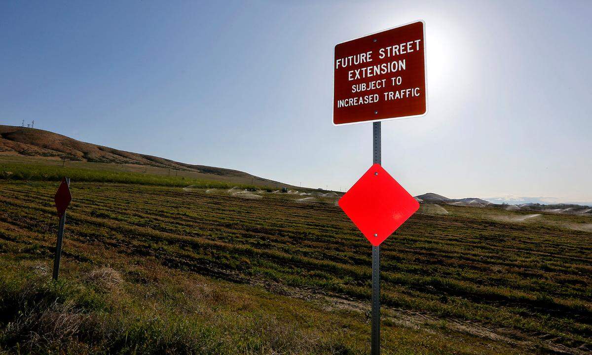 A sign in the 4100 block of Highview Street of a housing development near the south side of Badger Hill in Richland lets citizens know of future development for the area.