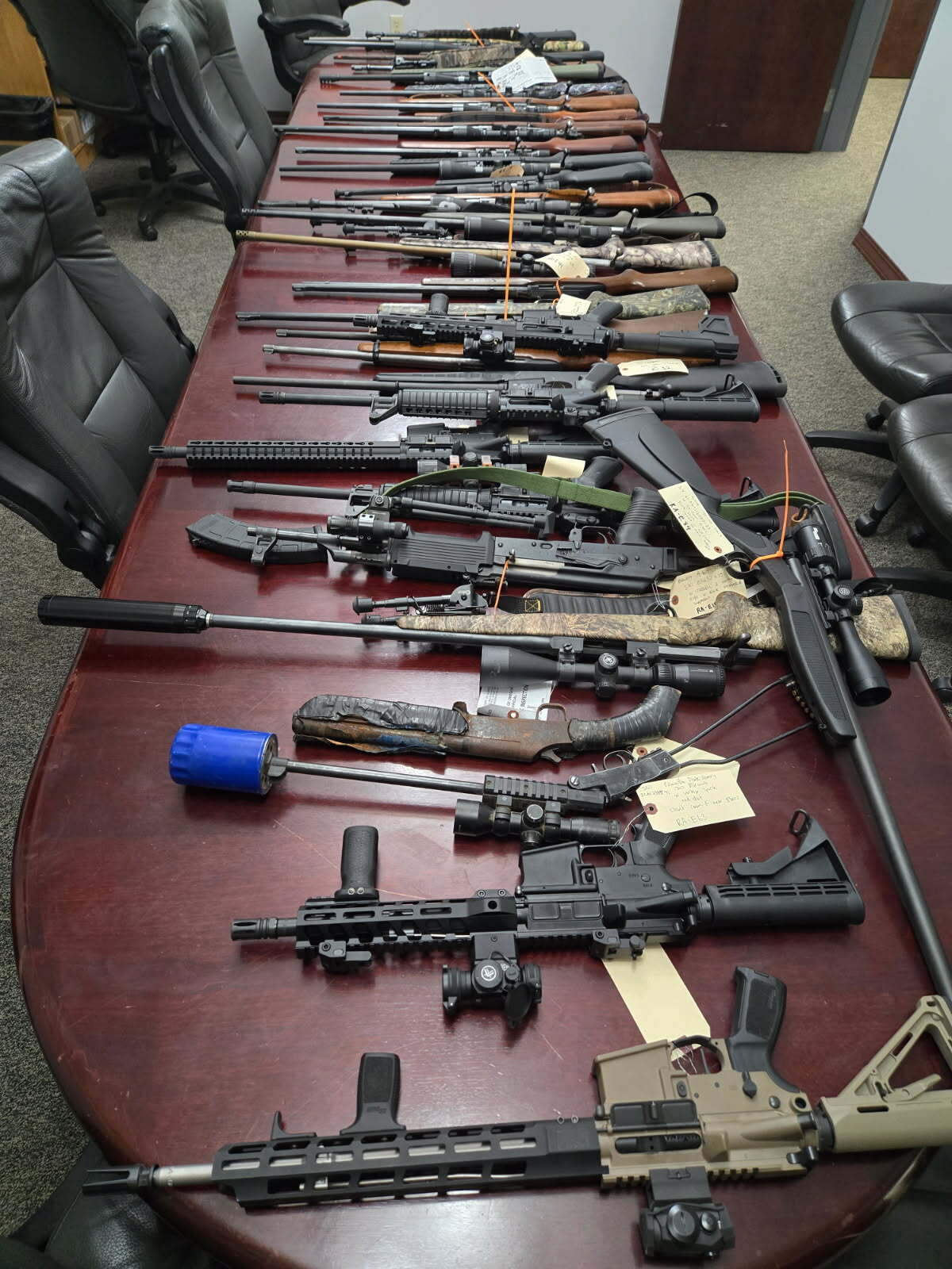 Firearms seized in the poaching and illegal hunting investigation of Christopher Matson, 48, of Umatilla, Ore. He has been sentenced to a liftetime hunting ban.