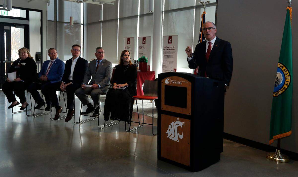 Gov. Jay Inslee announces he will ask the state Legislature this year for $10 million for the newly launched Institute for Northwest Energy Futures at WSU Tri-Cities during a press conference Monday at the Richland campus.