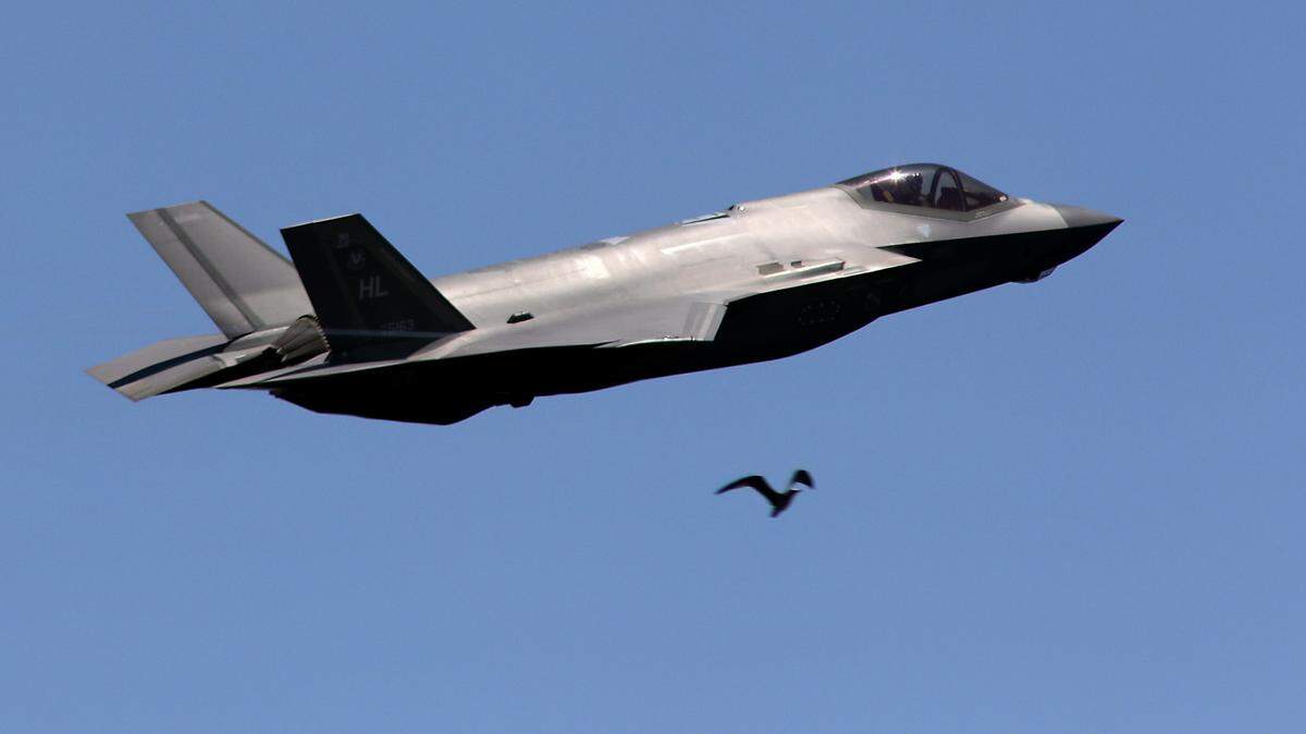 A gull flying over the Columbia River appears startled by the United States Air Force F-35A Lightning II fighter jet piloted by Major Kristen “BEO” Wolfe during the STCU Over the River Air Show Friday afternoon in the Tri-Cities. The air show repeats starting about 11 a.m. Saturday and Sunday during the three-day event.