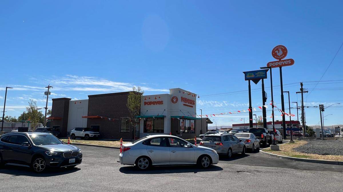 Drivers line the block to get a taste of the new Popeye’s Louisiana Kitchen in Kennewick on its second day open. It’s the first of the franchise in the Tri-Cities, and opening day drew long lines and a traffic mess to the area off Highway 395 near Clearwater Avenue and Vista Way.