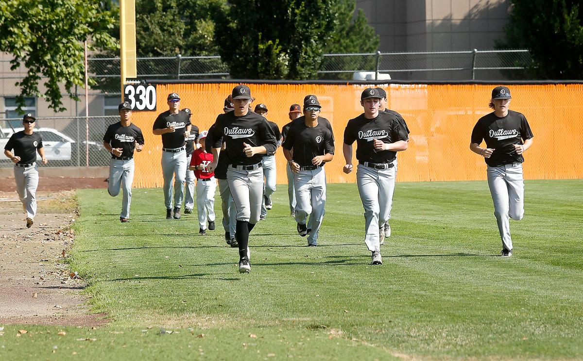 The Kennewick Outlaws American Legion senior baseball team starts its last team practice, before leaving for the regional tournament in Lewiston, Idaho, with a warm-up run at Roy Johnson Field in Kennewick. Watch a video at: tricityherald.com/video