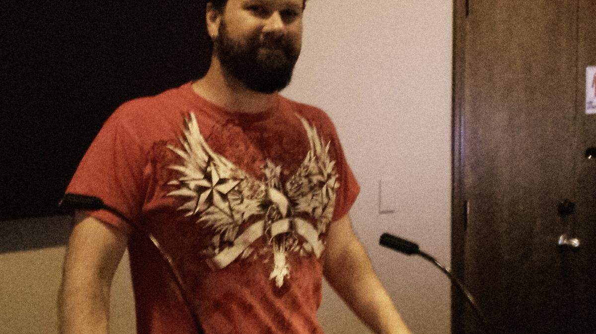 Jason Vorpagel stands pain-free as he manages the sound system at Columbia Community Church (3C) in Richland.