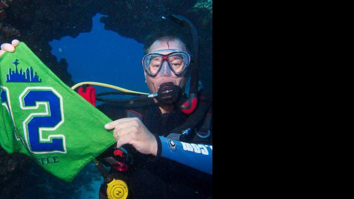 Larry Brookes of West Richland shows his true colors while diving off Maui, Hawaii.