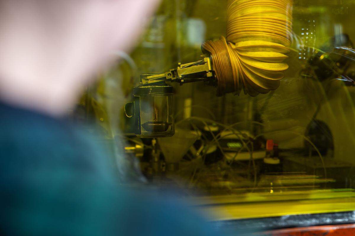 Safely working from outside a hot cell that shields them from radiation, PNNL researchers use manipulators to open legacy medical radioisotope sources of all shapes, sizes and chemical forms to recover radium-226, which could be used to produce actinium-225, a promising therapeutic radioisotope.