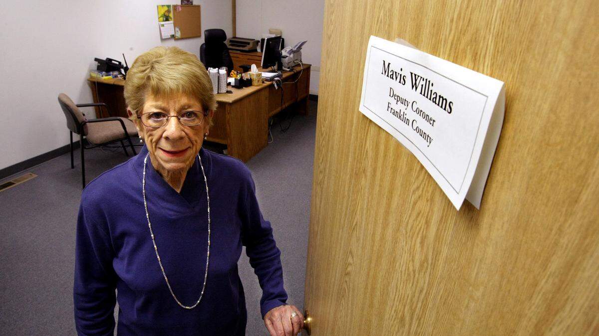 Mavis Williams, a deputy coroner for Franklin County, is shown at her retirement in 2012, after working for the county since 1977.