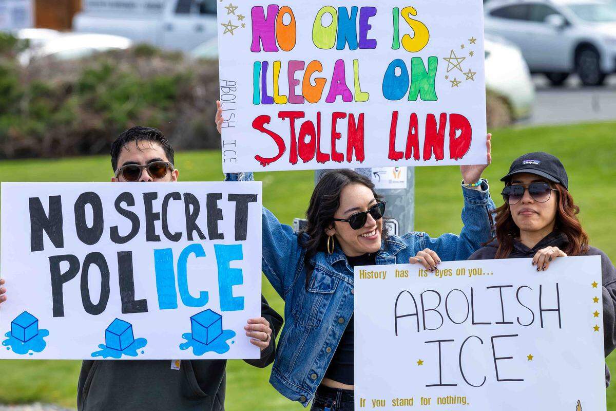 Demonstrators attend Saturday’s “No Kings” protest in Kennewick, protesting the Trump Administration and its military escalation in Iran. 