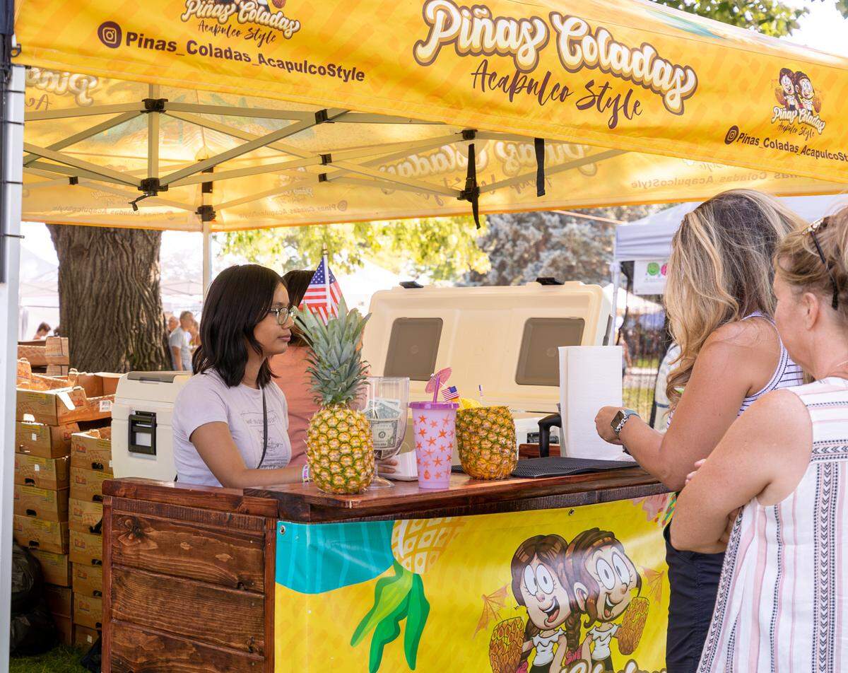Attendees at the Art in the Park Festival were able to get Pinas Coladas Acapulco Style and other drinks at different booths in the park.