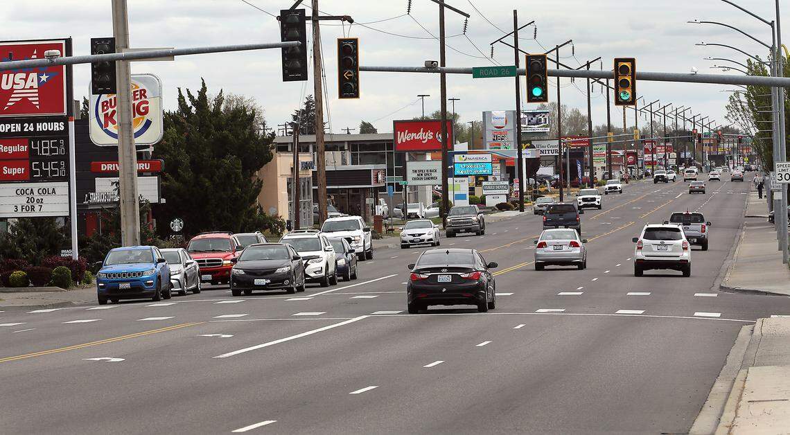 Traffic travels in the business district of West Court Street near Road 26, just east of the Highway 395 overpass, in Pasco.