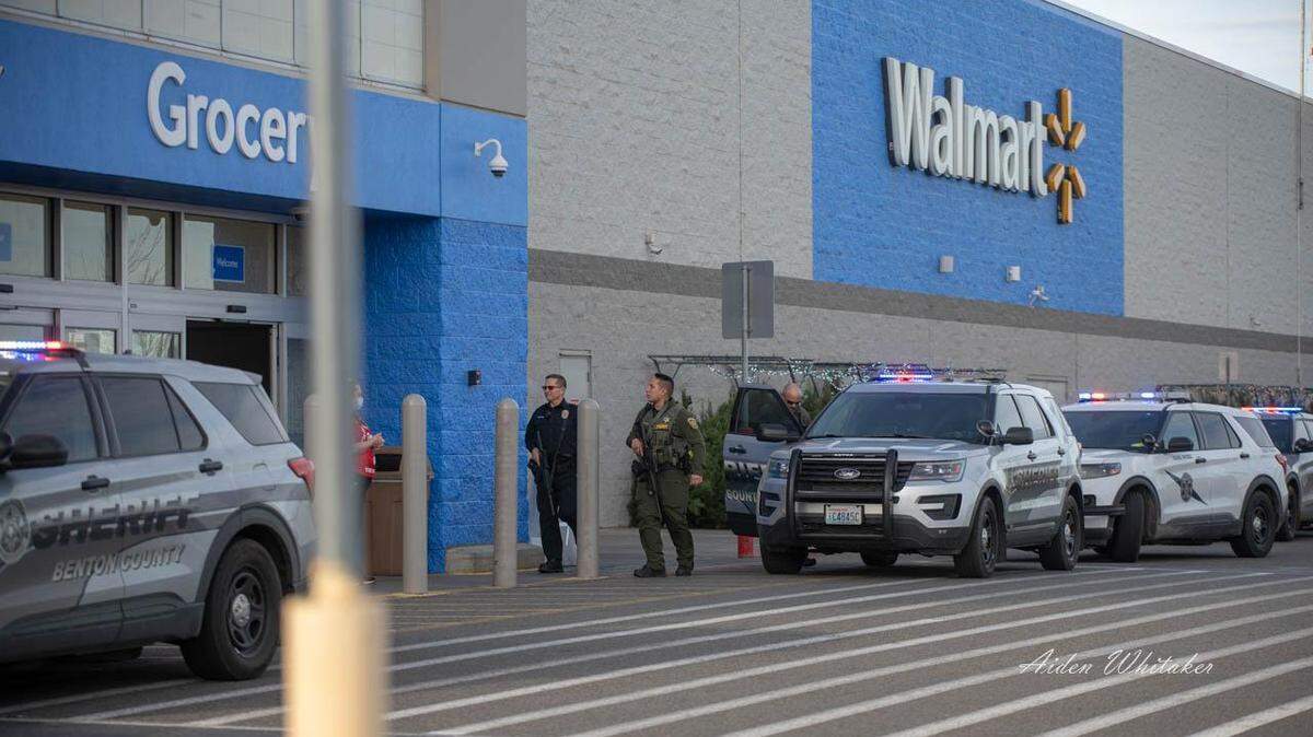 A suspected shoplifter was shot at and wounded by a security officer on Black Friday outside the Kennewick Walmart.