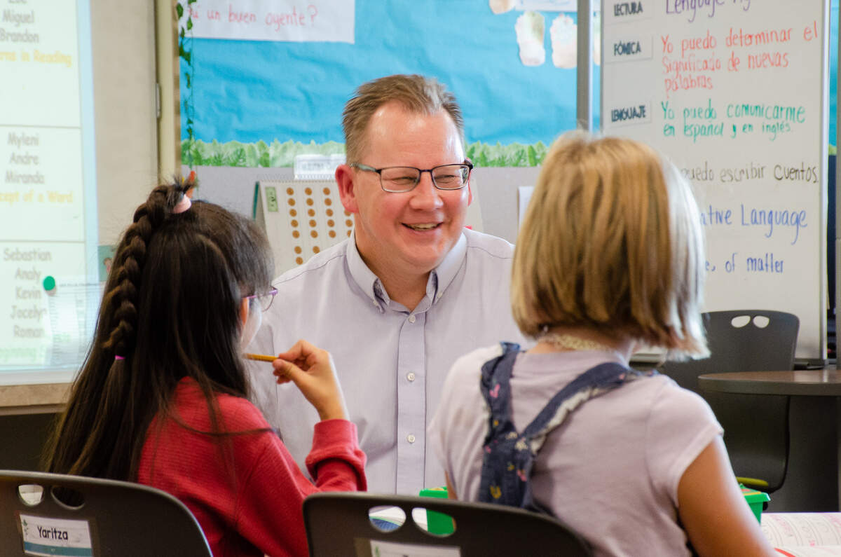 Washington State Superintendent Chris Reykdal visits with students at McClintock STEM Elementary in 2022.