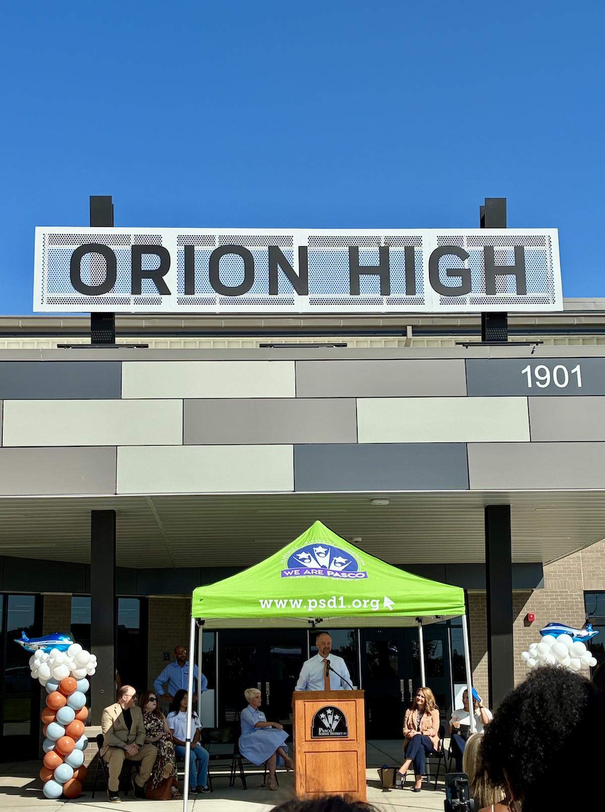 Orion High School Principal Seth Johnson speaks at the ribbon-cutting ceremony Tuesday, highlighting the school’s innovative career and college pathways.