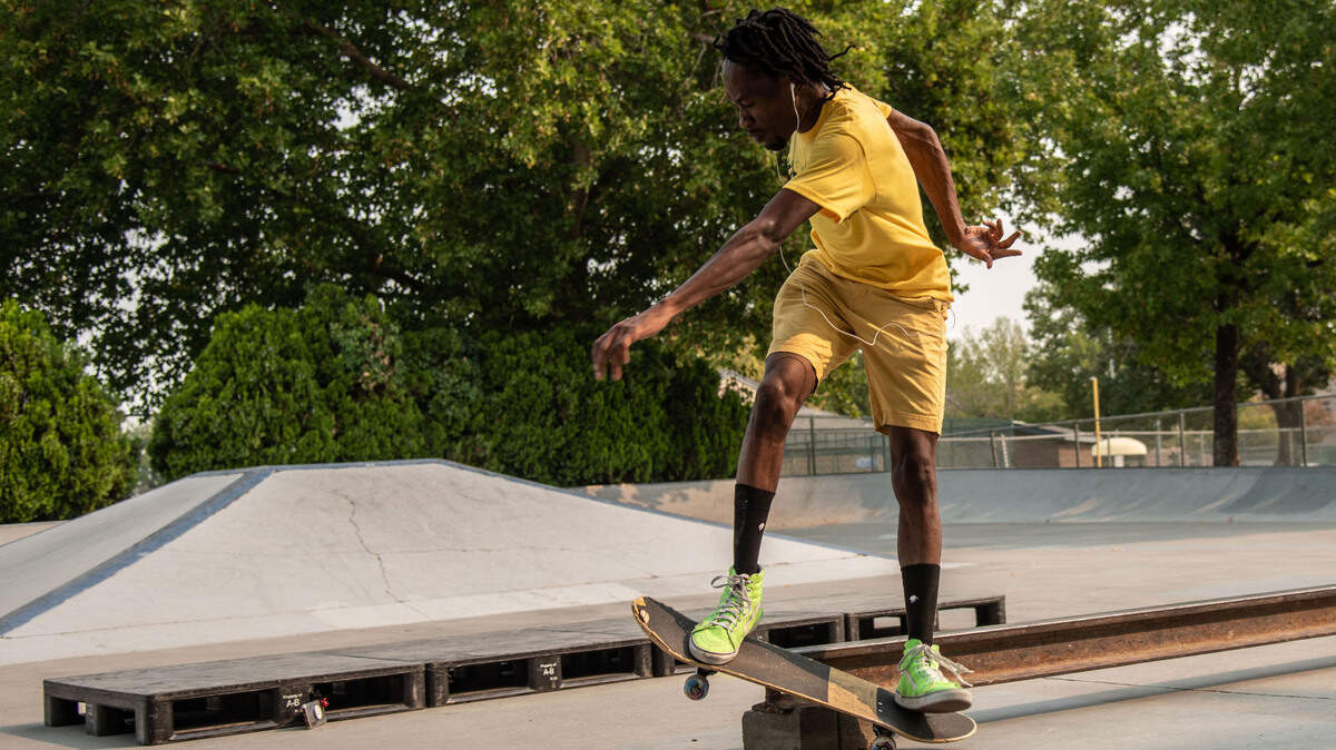 Ekelemchi Okemgbo, 26, of Richland finishes a board slide during a morning visit to the Kennewick Skate Park off of South Dayton Street.