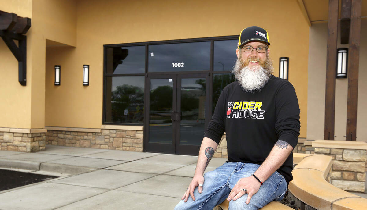 Nate Steele sits outside the location of his new business, Tri-Cities Cider House on George Washington Way in Richland. It’s scheduled to open this summer.